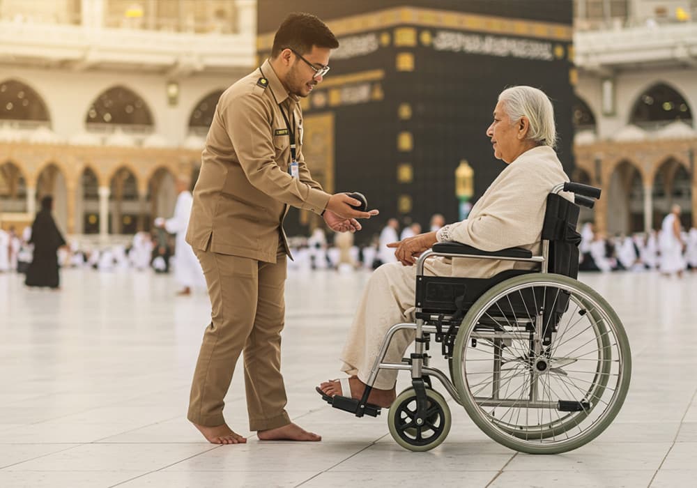 Elderly pilgrim receiving wheelchair assistance during Umrah